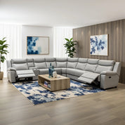 Ambassador Electric Motion Lounge Suite in light gray faux leather with reclining modules and a spacious corner