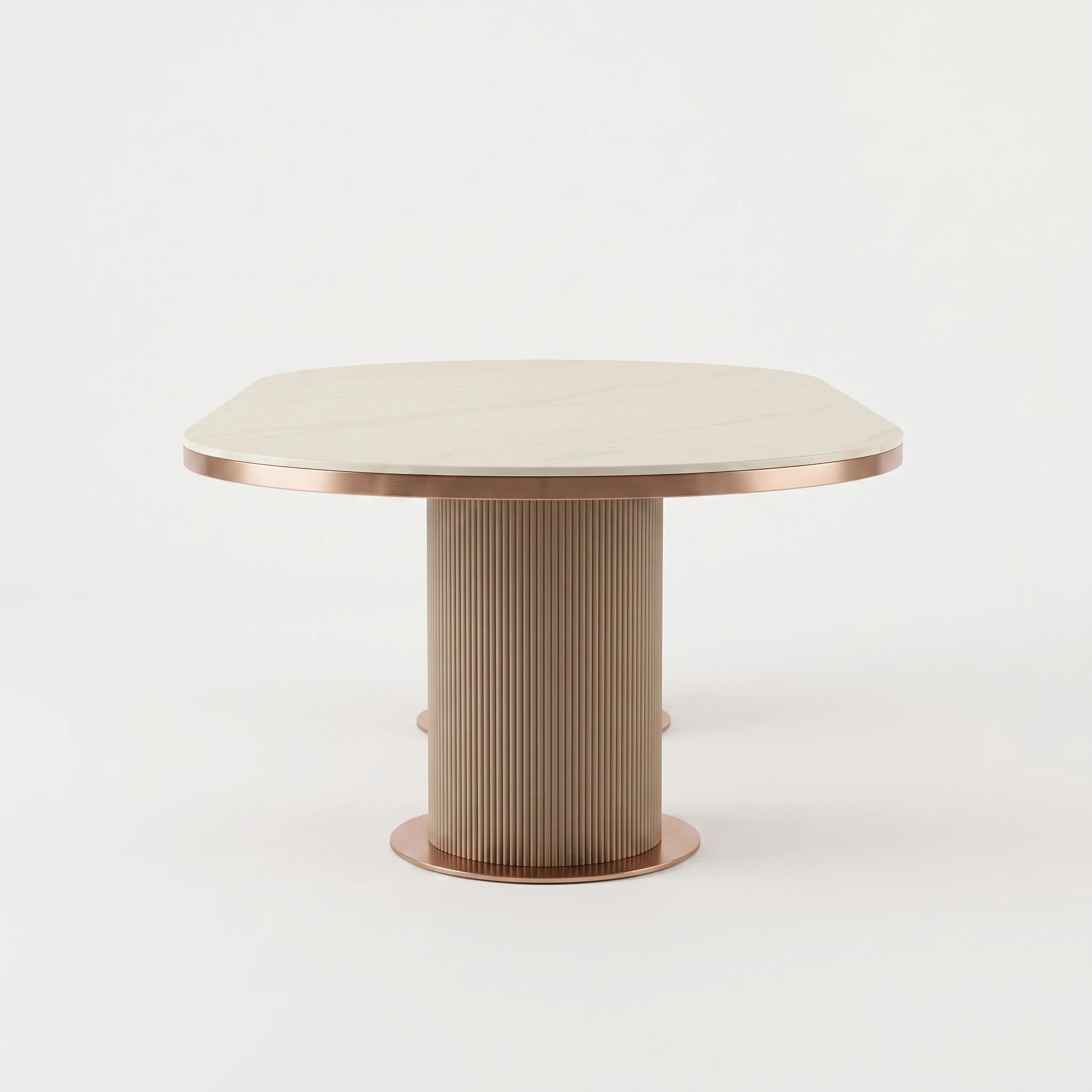 Ariano Dinning Room Table with white marble-look round top and rose gold metal trim on fluted pedestal base.