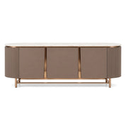 Ariano Sideboard with white marble top, taupe body, fluted sides, and rose gold metal base on a white background.