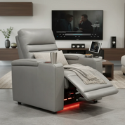 Baxter Power Recliner Chair in gray leather with adjustable headrest and footrest, featuring a built-in tablet stand and cup