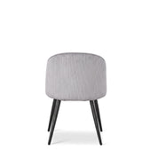 Blaze dining room chair in grey ribbed velvet with black tapered legs, shown from the back.