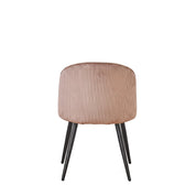 Blaze Dining Room Chair with ribbed peach/pink velvet upholstery and tapered black metal legs, viewed from the back.