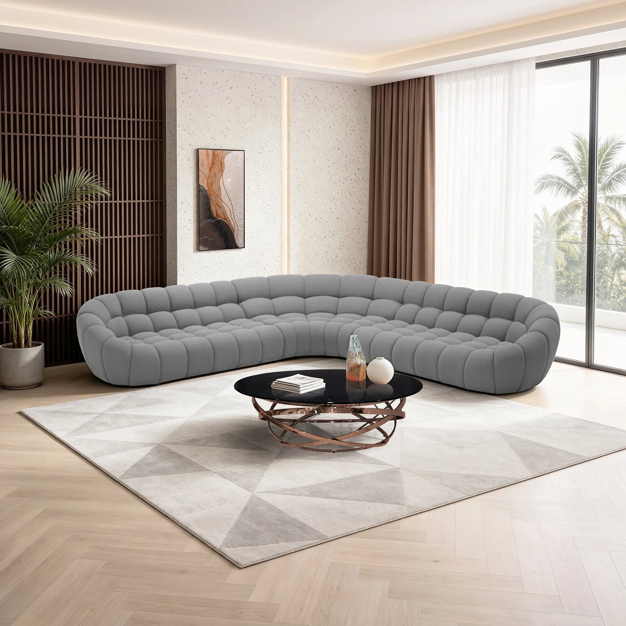 Bubble Sofa in gray with a curved, tufted design; a modern sectional ideal for contemporary living rooms.