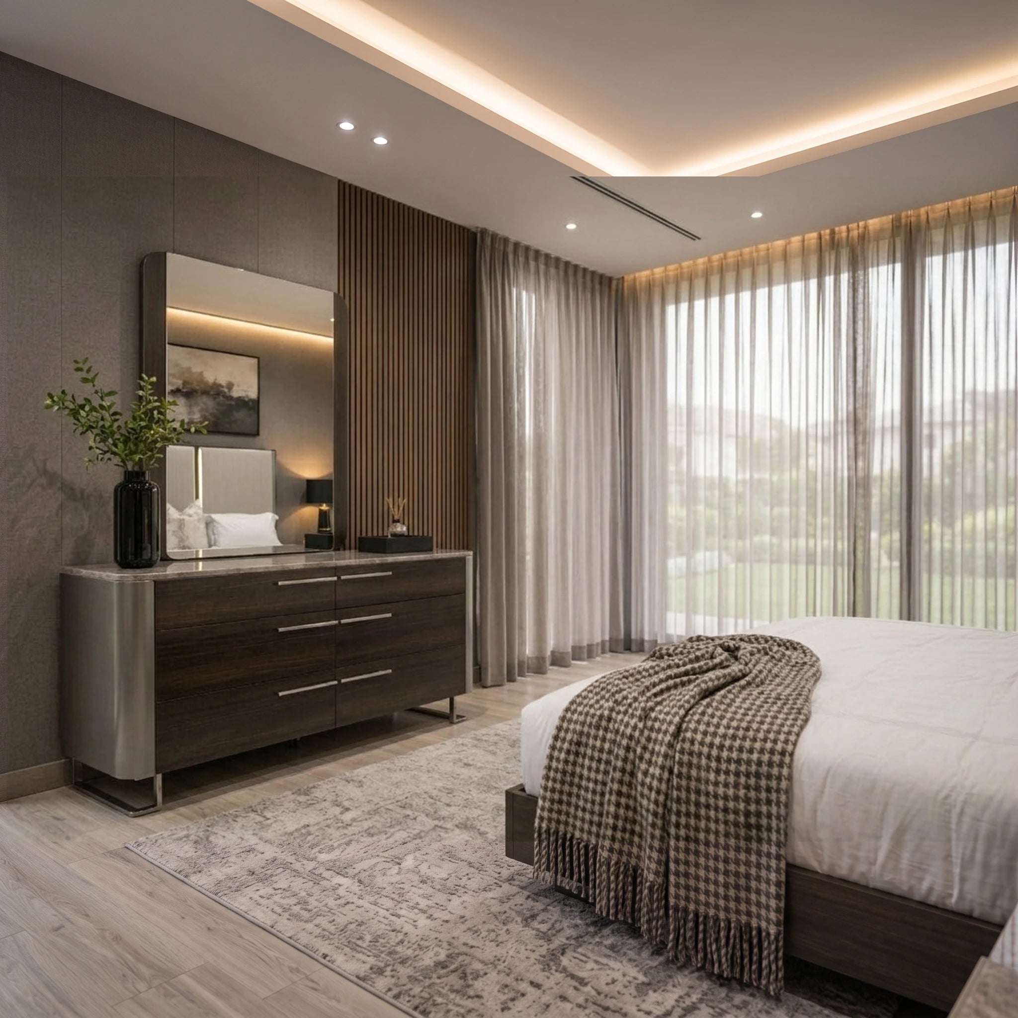 Cassino dressing table and mirror in black oak finish with metal handles, showcased in a modern bedroom setting.