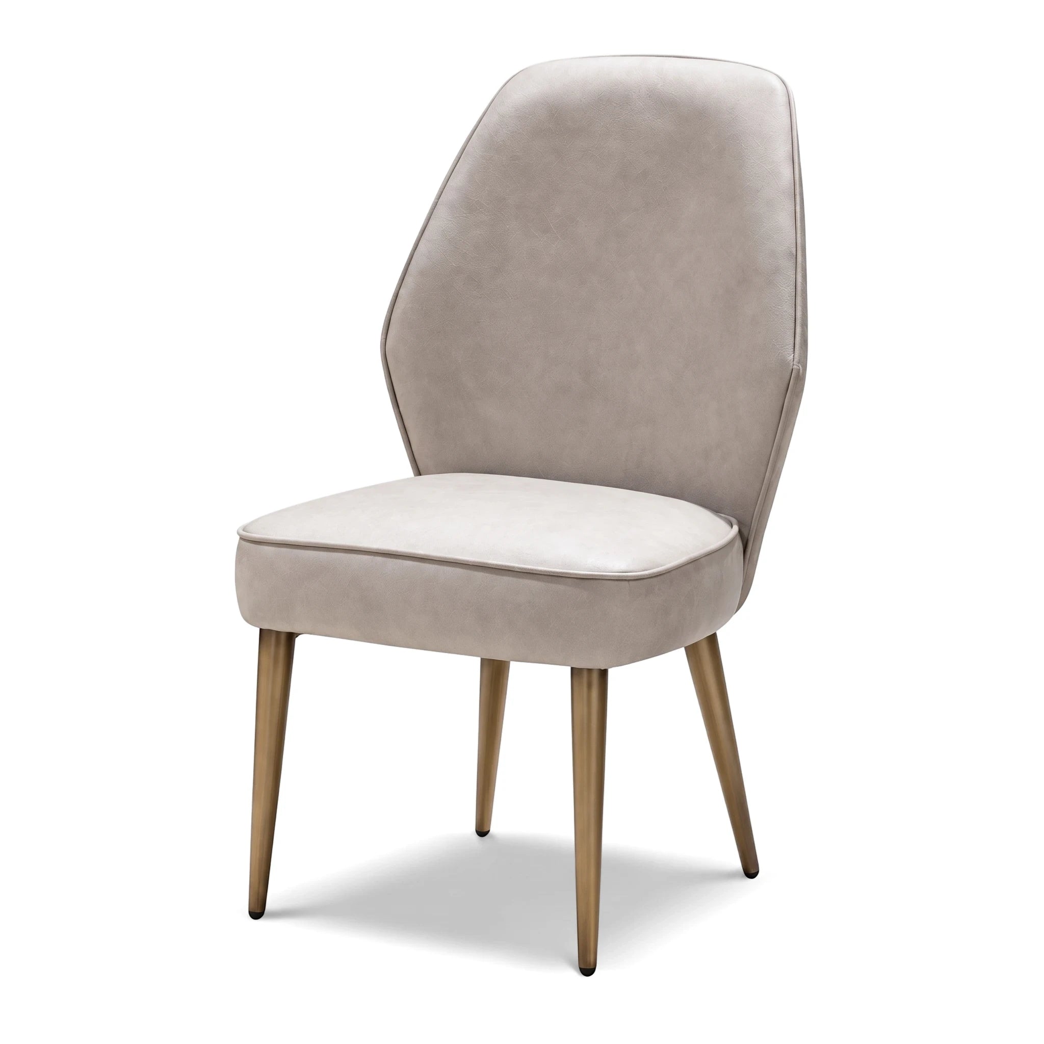 Harmony Dining Room Chair with beige upholstery and gold tapered legs, viewed from a slight angle.