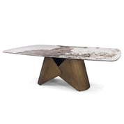 Modern Harmony Dining Room Table with a rectangular marble-patterned top and a striking bronze sculptural base.