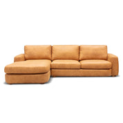 Hickory L-Shape Lounge Suite crafted from tan leather, featuring a chaise lounge on the left and three seat cushions.
