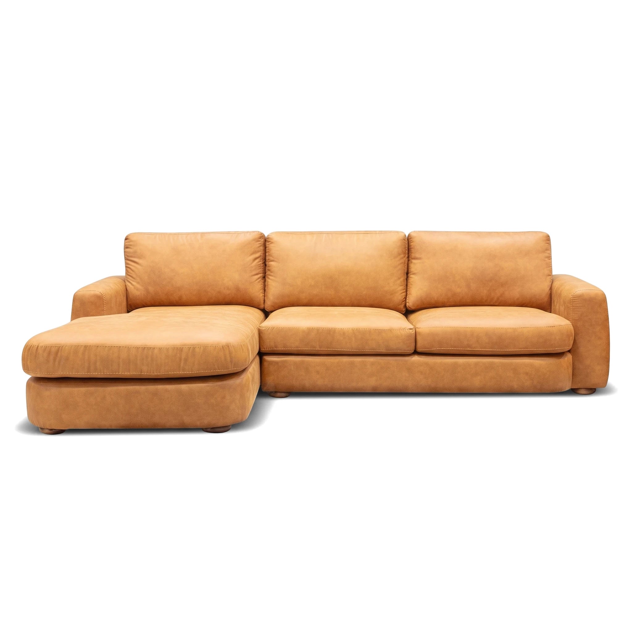 Hickory L-Shape Lounge Suite crafted from tan leather, featuring a chaise lounge on the left and three seat cushions.