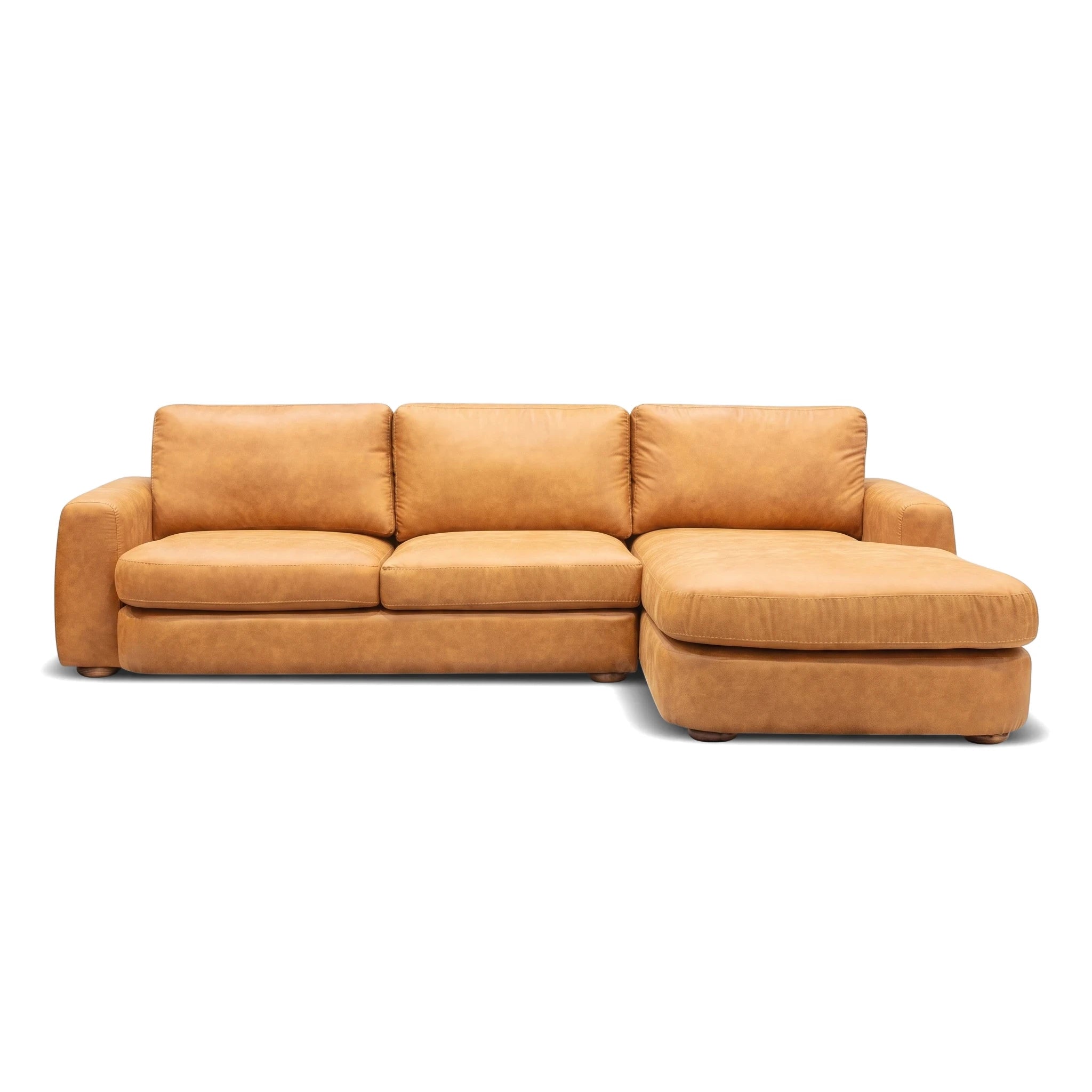 Hickory L-shape lounge suite in tan leather, front view with visible stitching and wooden feet.