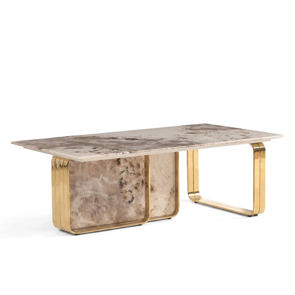 Modern Leonardo coffee table with a rectangular white and brown marble top and stylish curved gold metallic legs on a white