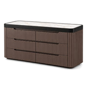 Luciana dark brown fluted wood dressing table with a white marble top and black trim, featuring six drawers.