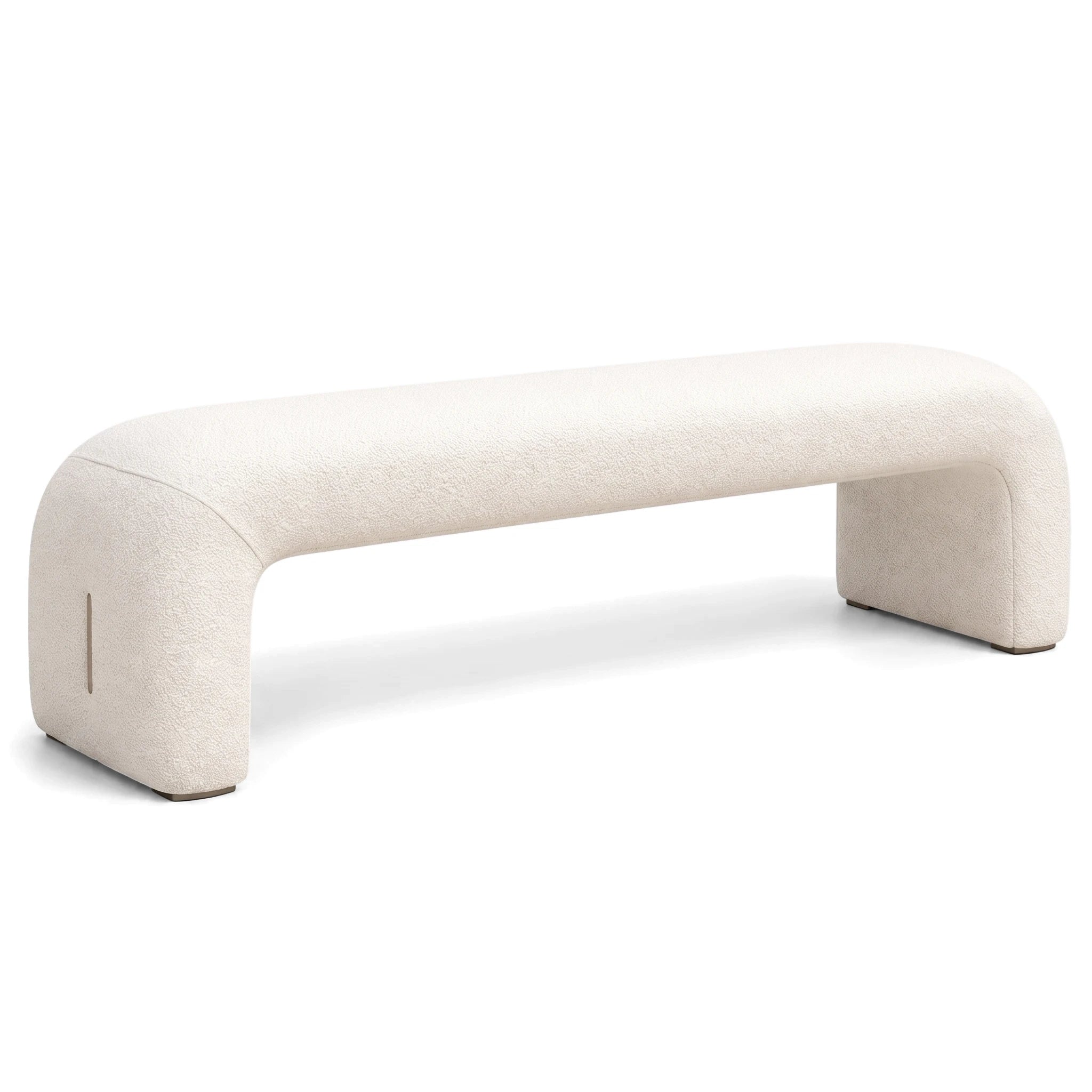 A neutral off-white Luciana Ottoman bench with a textured bouclé fabric, featuring a modern, minimalist design with rounded