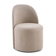 Melrose Dining Room Chair On Wheels, featuring a beige upholstered finish and a curved back, viewed from the front-left.