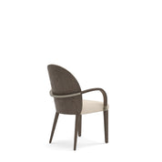 Montpellier Dining Room Chair with dark wood frame, curved backrest, and light upholstered seat, shown from a rear-side view.