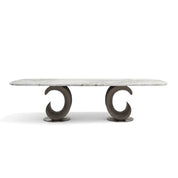 Modern Montpellier Dining Room Table with an oblong white marble top and two dark curved wooden pedestal bases.