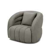 A modern grey upholstered Morris swivel chair with distinctive channel tufting and a soft cushion, viewed from a slight