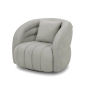 Modern Morris Swivel Chair in light grey upholstered fabric with channel tufting and a matching throw pillow on a white
