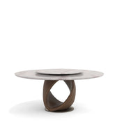 Reims dining room table with a white marble top and a unique twisted dark wood base, designed for modern interiors.