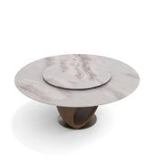 REIMS DININGROOM TABLE with a round white marble top, a rotating marble server, and a unique carved wood base.