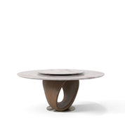 REIMS DININGROOM TABLE with a white marble top, a matching lazy Susan, and a unique sculptural wooden base.