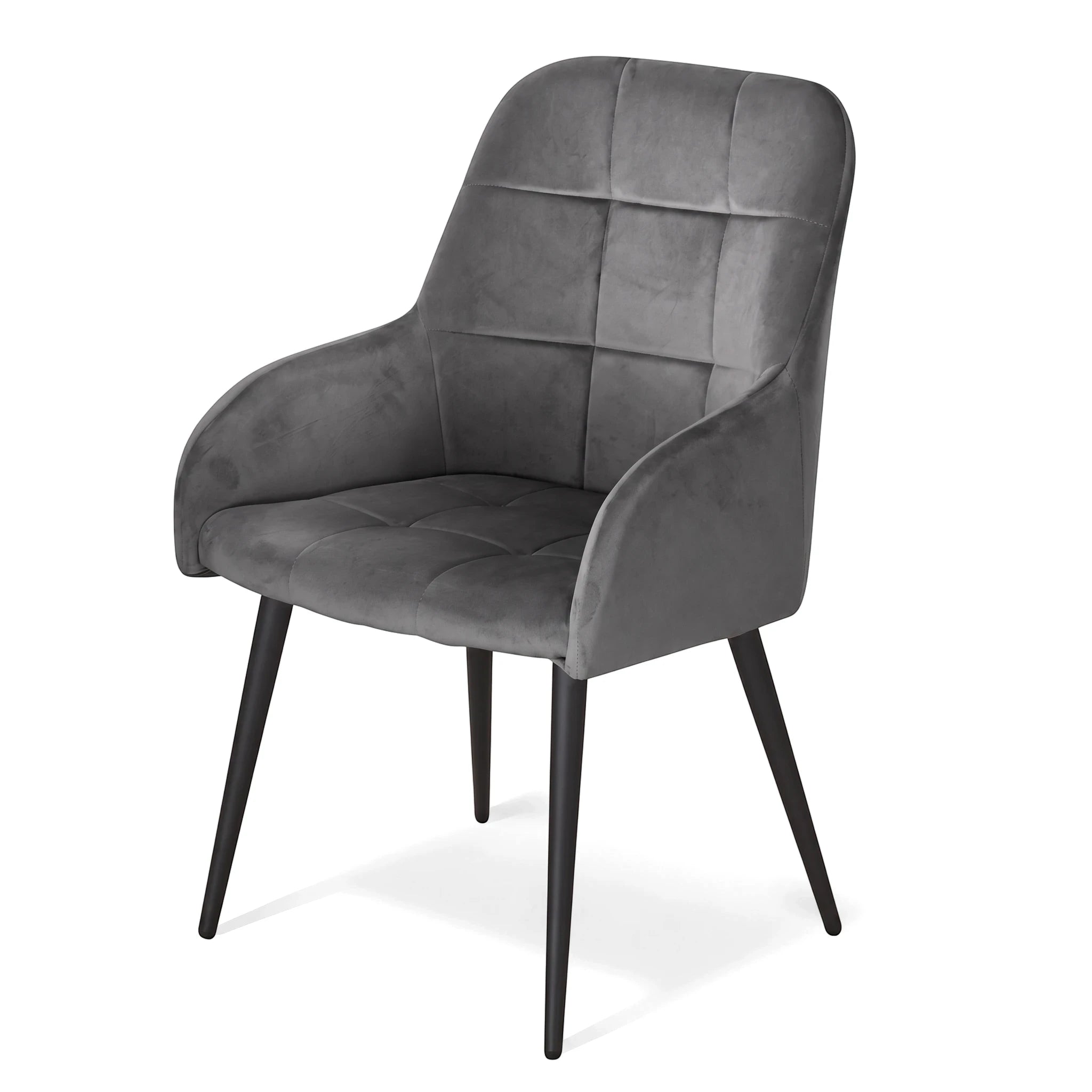 Grey velvet Santos dining room chair with a tufted back and black tapered legs, shown from a three-quarter view.