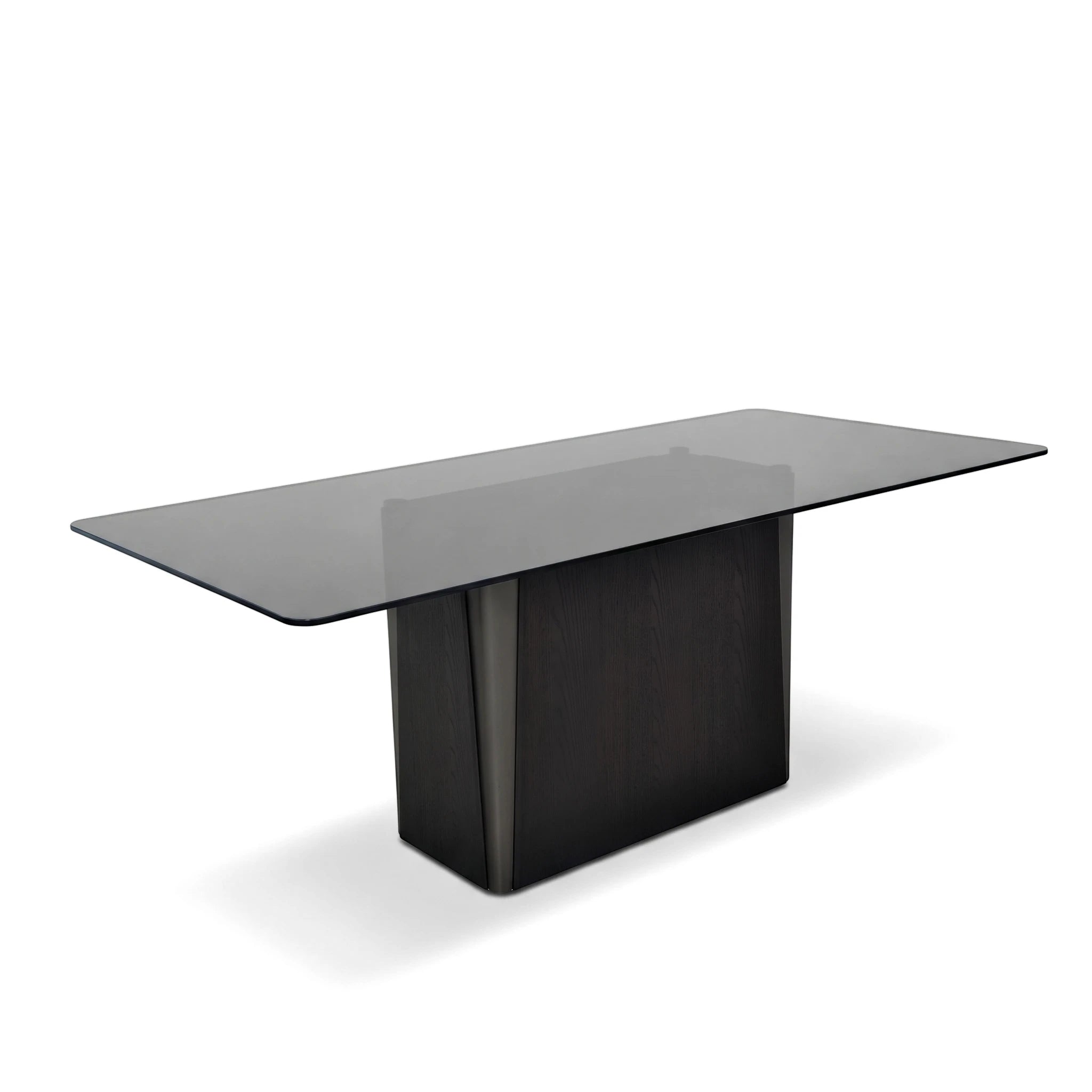 A rectangular Sierra Dining Room Table with a dark glass top and a solid, dark wood pedestal base, shown from an elevated