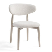 Stirling Dining Room Chair featuring a white textured fabric seat and backrest with slender champagne gold metal legs.