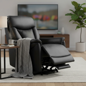 Tate Hi-Lift Recliner Chair in black leather with a gray knit throw draped over the arm, shown in a modern living room