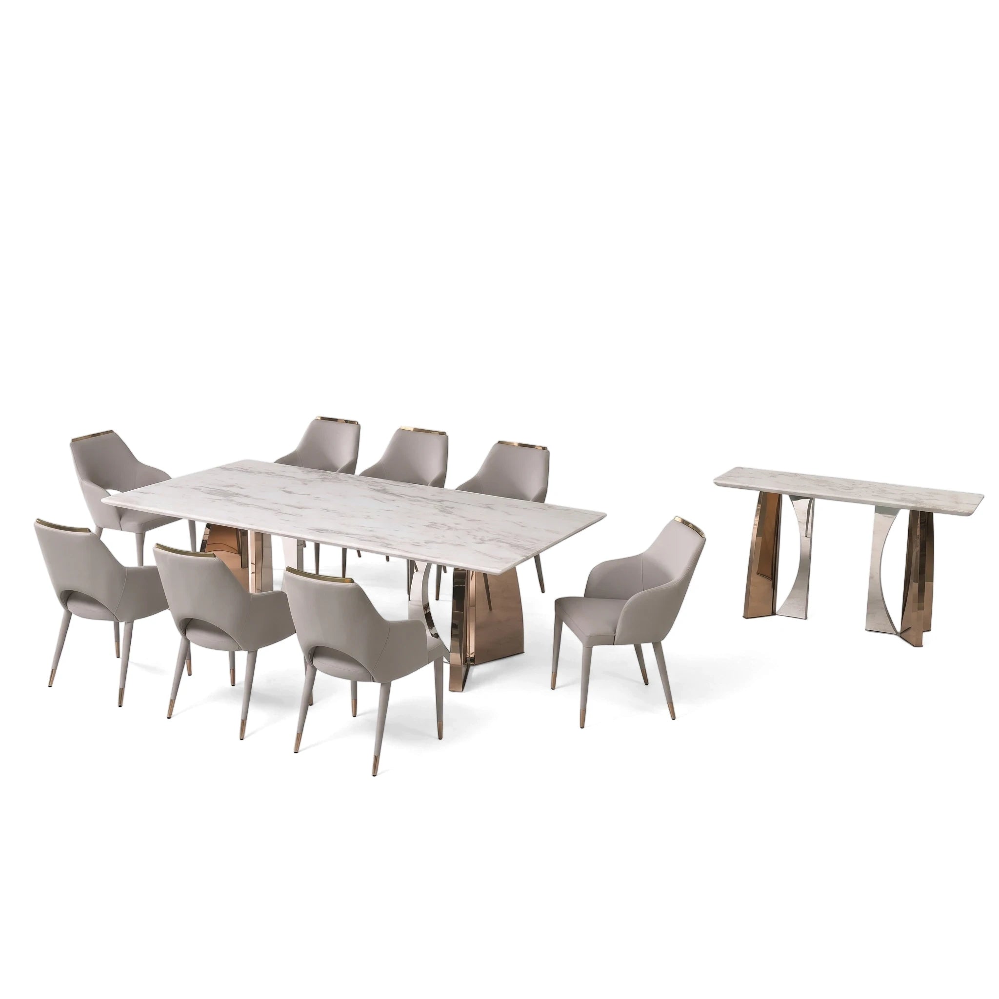 Umberto rose gold dining room table with white marble top, eight light gray upholstered chairs, and a matching rose gold